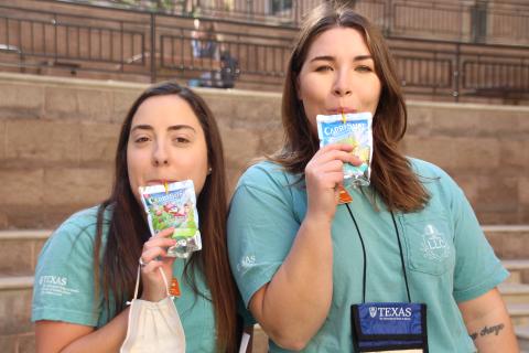 •	Alicia Monaco and Kayleigh Damphousse (New Student Services) at First Come, First Serve