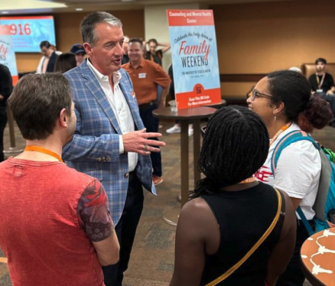 President Hartzell (back, center) mingles with attendees at the Family Weekend Celebration Kick-Off Event