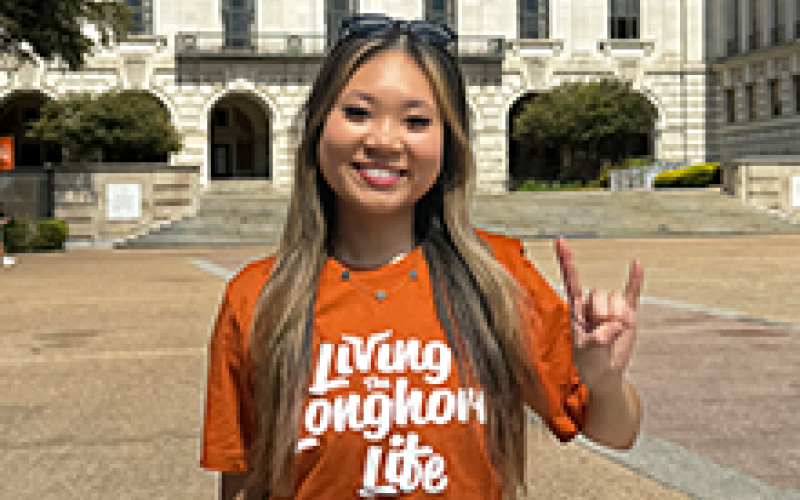 Student wearing Living the Longhorn Life Merchandise