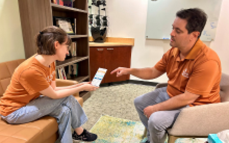 A photo of a student in the counseling and mental health center getting support from a staff member