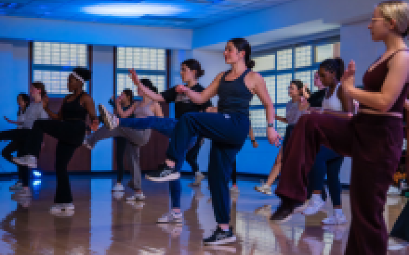 students at a group fitness class with recreational sports